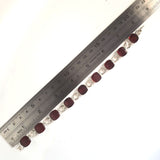 red cherry amber with silver bracelet