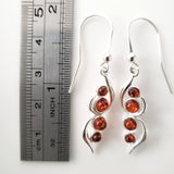 Dangle amber earrings with silver