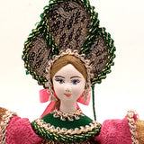 doll in pink Christmas ornament