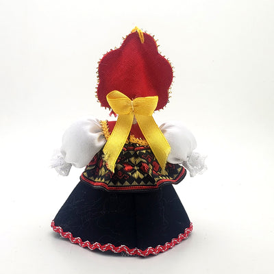 back of doll in black dress Christmas ornament