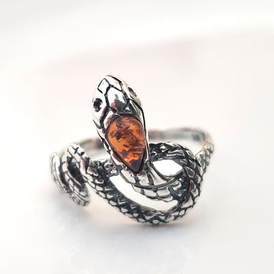 silver snake with natural amber ring