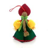 Christmas ornament doll in a green dress 