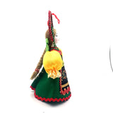 Christmas ornament doll in a green dress