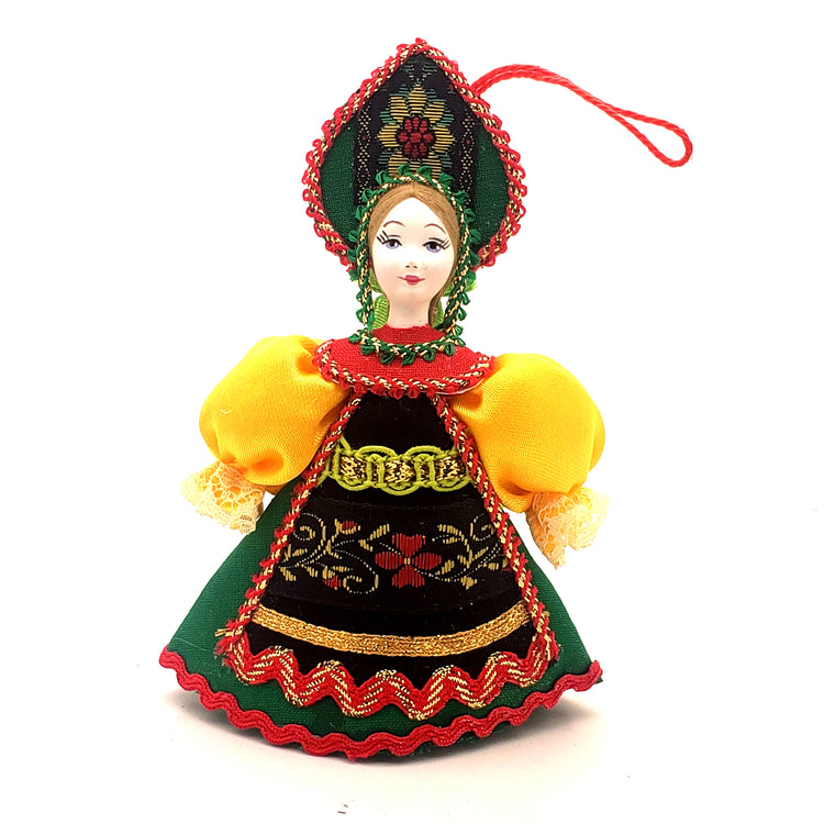 doll in a green dress Christmas ornament