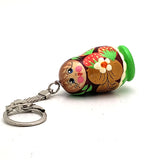 Green Nesting Doll Keychain with Strawberry