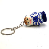 White Matryoshka Doll Keychain with Blue Flowers