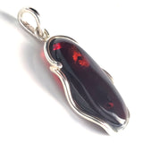 large oval cherry amber pendant
