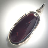 Large oval cherry red pendant in silver 