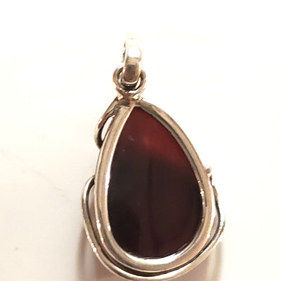 back of amber pendant