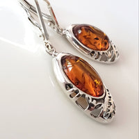 oval cognac amber filigree amber earrings