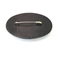 oval black pin