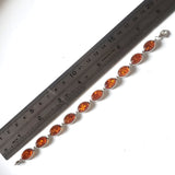 Sterling silver with oval amber beads link bracelet