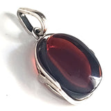 red amber pendant in sterling silver