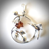 Sterling silver pendant with humming beard and the amber rose 