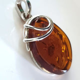 genuin amber pendant in silver