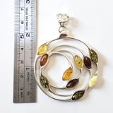 large circular silver amber necklace