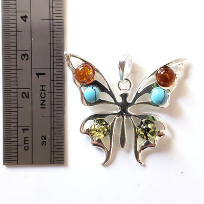 silver butterfly with amber and turquoise beads