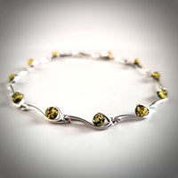 Sterling Silver large bracelet with round green natural amber beads 