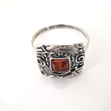 large silver square ring with amber