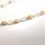 butterscotch amber bracelet in silver