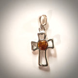small sterling silver cross with amber