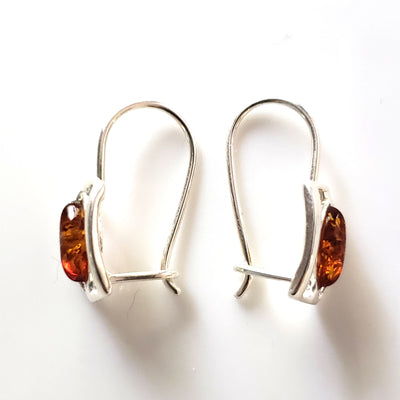 square silver hoop earrings with oval amber