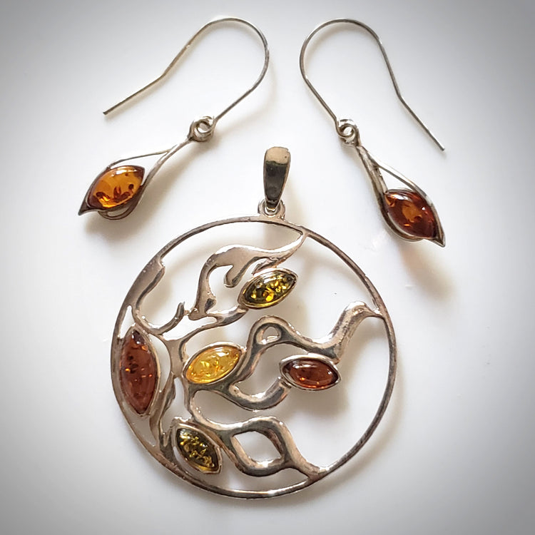 sunburst silver pendant with earrings set